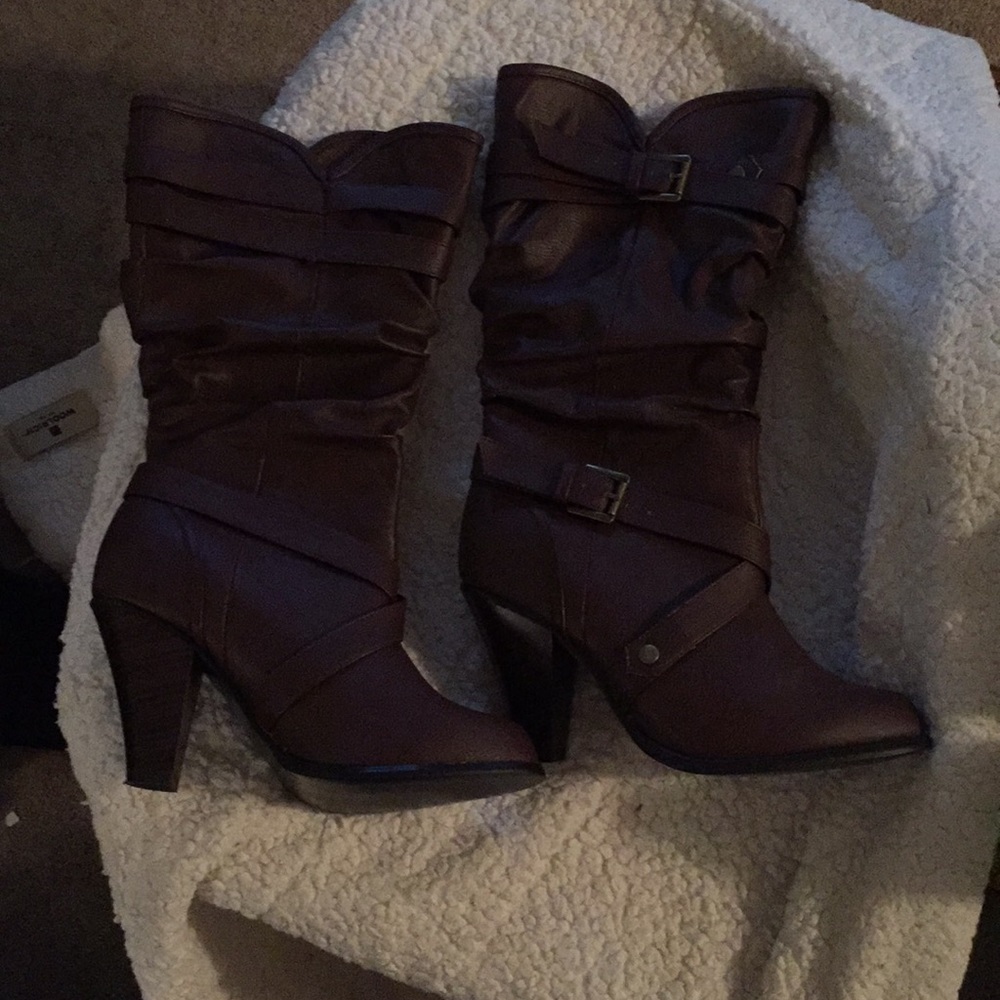 Brown boots with heels...